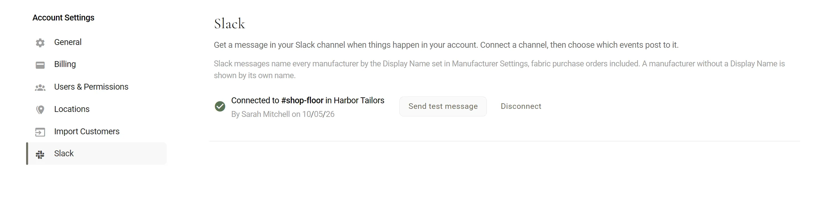 Account Settings with Slack selected in its menu. The Slack page shows its description, a note about manufacturer Display Names, and Connected to #shop-floor in Harbor Tailors, by Sarah Mitchell on 10/05/26, with Send test message and Disconnect buttons.